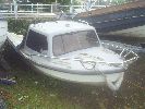 Dejon 14 - These are well known cuddy dayboats. With a 15hp or more she will fly along. She needs a good clean & tidy up.