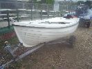 Orkney Spinner - These are very safe & stable boats for fishing or family use. Comes with custom trailer & modern 6hp Mariner.